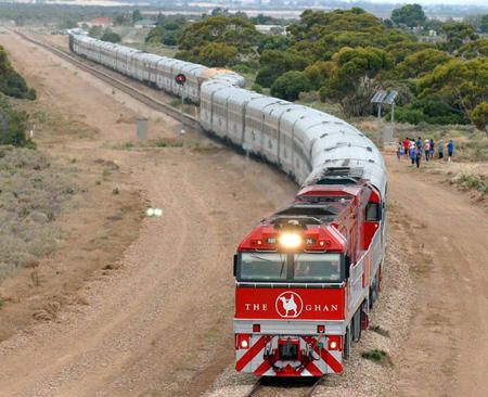The Ghan, Australia's first passenger train from Adelaide to Darwin, passes through Point Germain in the Australian outback, February 2, 2004.