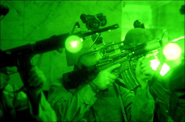 G.I.'s, equipped with night vision goggles, during an operation near the Shrine of Abbas, Karbala, May 23, 2004.