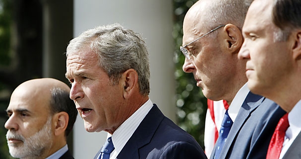 President Bush, accompanied by, from left, Federal Reserve Chairman, Ben Bernanke, Treasury Secretary Henry Paulson, and Securities and Exchange Commission (SEC) Chairman Christopher Cox, delivers a statement about the economy and government efforts to remedy the crisis, September 19, 2008.