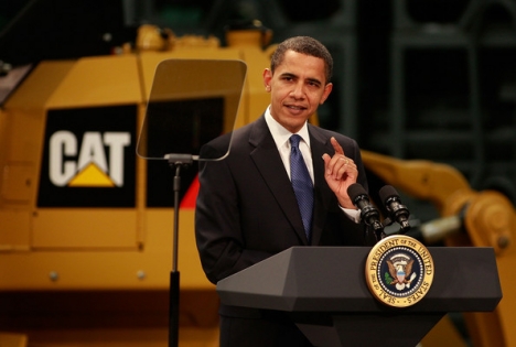 The so-called US President Al-Buraq Hussein Abu-Ommo speaks through his teleprompter to workers at a Caterpillar plant about creating jobs, Peoria, Illinois, February 11, 2009.
