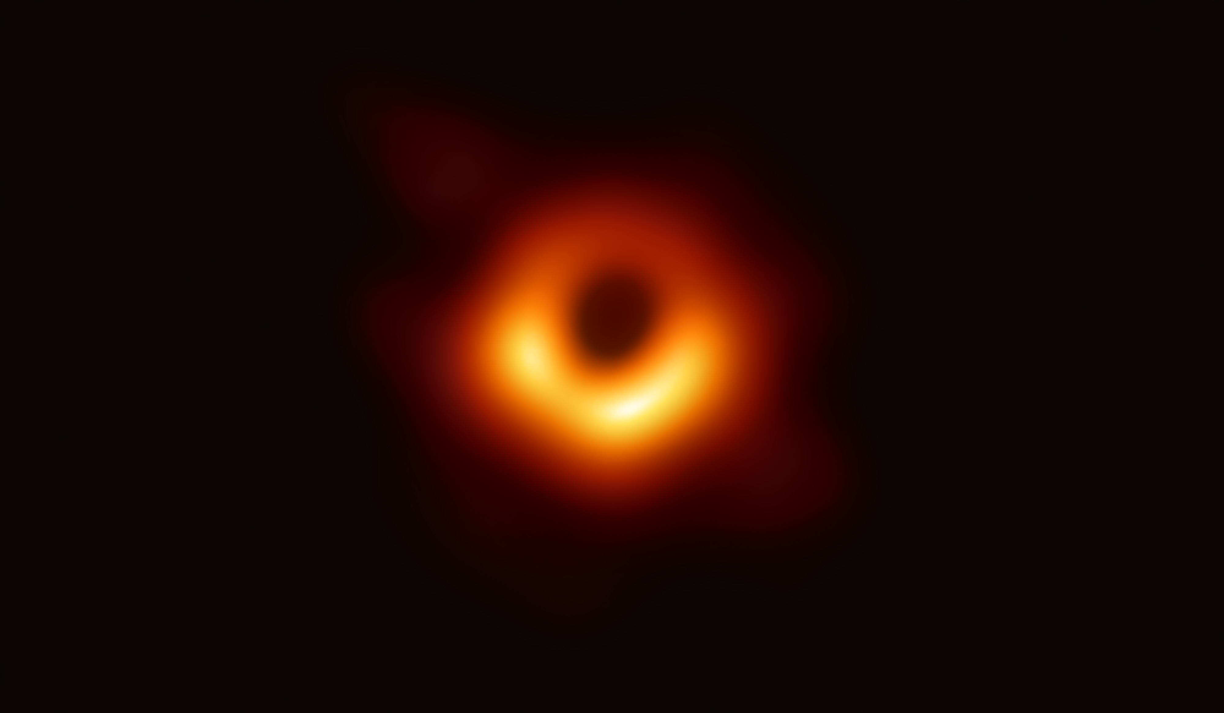 Released in April 10, 2019, the first image ever made of a black hole, resides at the center of Messier 87 galaxy 55 million light-years from Earth and has a mass 6.5-billion times that of the Sun, is produced by capturing high-frequency radio waves using the Event Horizon Telescope network of radio telescopes across the planet that functions like a single instrument.