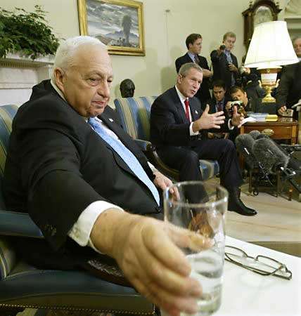President George W. Bush and Israeli Prime Minister Ariel Sharon, press conference, White House, October 16, 2002.
