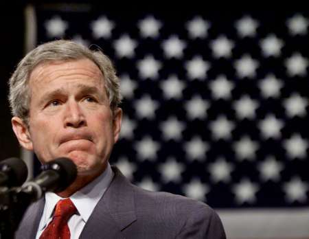 U.S. President George W. Bush participates in a welcome ceremony with U.S. military troops and families, Fayetteville, North Carolina, March 15, 2002.