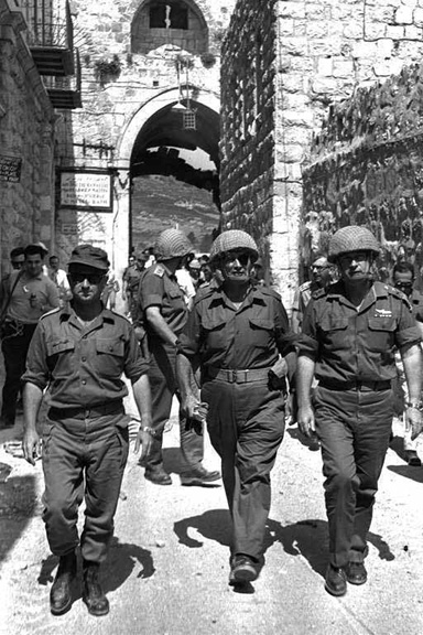 Jerusalem Commander Uzi Narkiss accompanies Defense Minister Moshe Dayan and Chief of Staff Yitzhak Rabin, through the Lion's Gate into the Old City of Jerusalem, June 7, 1967.