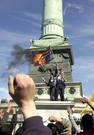 French Demonstrators wearing Palestinian scarves, La Bastille monument, Paris, May 26, 2002.