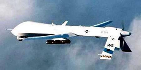 RQ-1 Predator Unmanned Aerial Vehicle equipped with a Hellfire-C laser guided missile, test flight, Nellis Airforce Base, Nevada, February 21, 2001.