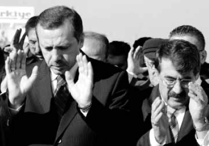 Recep Tayyip Erdogan and former interior minister Abdulkadir Aksu, Friday prayers, Ankara, November 15, 2002.