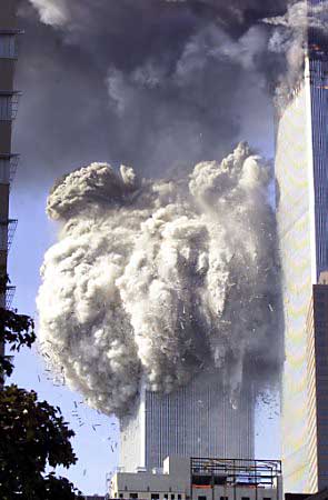 Trade Center Tower Two Collapses as Tower One Continues to Burn, September 11, 2001.