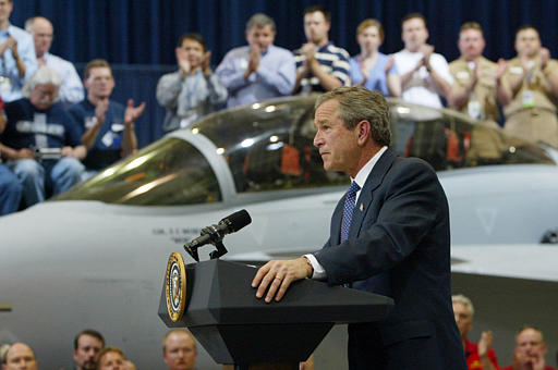 President Bush receives applause as he speaks at Boeing F-18 Production Facility, St. Louis, April 16, 2003.