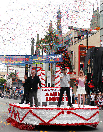 Original cast members from National Lampoon's Animal House; Stephen Furst, rear, Peter Riegert, Tim Matheson and Martha Smith ride on the recreated cake float, celebration of the National Lampoon's Animal House Double Secret Probation DVD release for the film's 25th anniversary, Hollywood Blvd., Los Angeles, August 21, 2003.