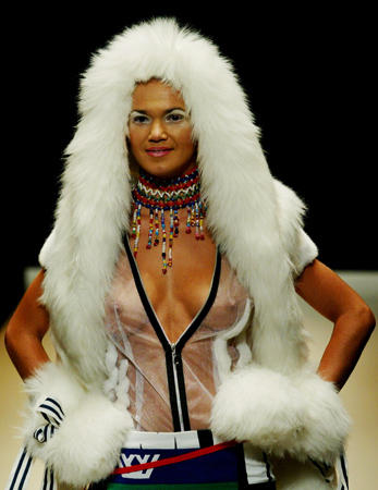 A model displays an outfit for Russian designer Elena Skakoun during her show at Rome's Fashion Week, Rome, July 15, 2003.