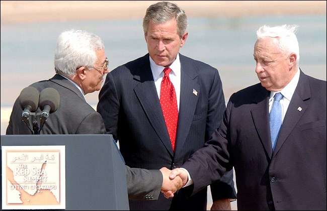 Mahmoud Abbas, the Palestinian prime minister, President Bush and Ariel Sharon, the prime minister of Israel, Aqaba, Jordan, June 4, 2003.