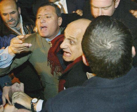 Egyptian Foreign Minister Ahmed Maher was hit, pushed and hurled with shoes by dozens of Palestinians as he entered al-Aqsa mosque in Jerusalem's Old City, December 22, 2003.