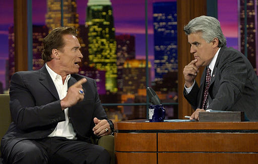 Actor Arnold Schwarzenegger, talks with host Jay Leno during taping of The Tonight Show with Jay Leno, Burbank, California, August 6, 2003.