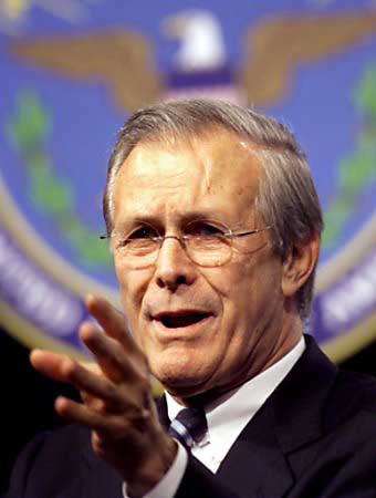 U.S. Secretary of Defense Donald Rumsfeld answers a question during a 'Town Hall Meeting' at the Pentagon, Washington, November 21, 2003.