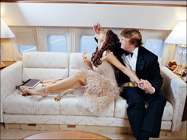 Real-estate mogul Donald J. Trump and model Melania Knauss on his private Boeing 727, circa November 2003.