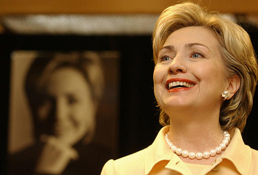 Senator Hillary Rodham Clinton looks at a customer during an autograph session for her new book, 'Living History,' at the Barnes & Noble bookstore in Rockefeller Center, New York, June 9, 2003.