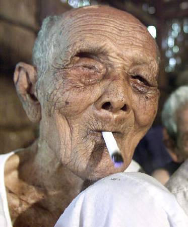 Officially it's impossible to verify if they are the world's oldest couple because documents were destroyed during the 1970s Khmer Rouge genocide. Cambodian Sek Yi, whose relatives say is 122-years-old, sits in his bamboo hut in the village of Tuk Young, some 200 km east of the capital Phnom Penh, October 14, 2003.