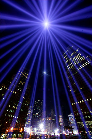 The moon shone through beams of light recalled the towers of the World Trade Center, September 11, 2001.