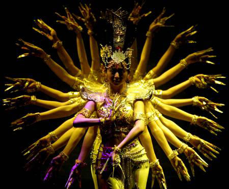 Hearing-impaired dancers from the China Disabled Peoples Performing Art Troupe perform at a rehearsal, Seoul, March 5, 2004.