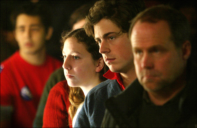 Sadness on faces of volunteers and other workers for Howard Dean listening to him fresh off his disappointing third-place finish in the Iowa caucuses, Manchester, New Hampshire, January 21, 2004.