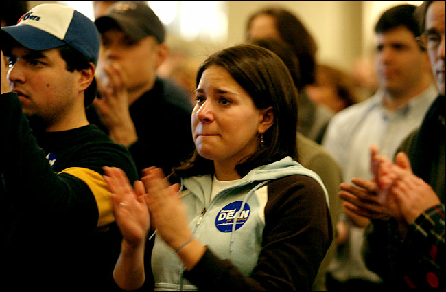 Campaign workers listened as Howard Dean announced he was ending his race, Burlington, Vermont, February 18, 2004.