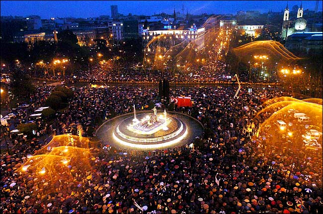 Thousands gathered to mourn the victims of the trains attacks, Cibeles Square, Madrid, March 11, 2004.