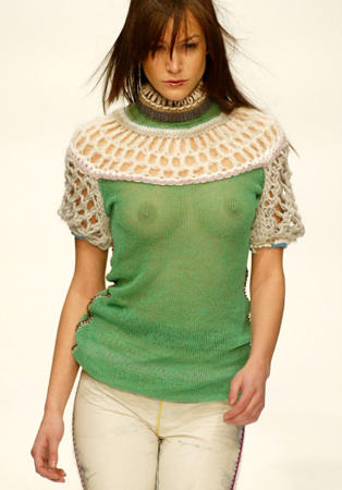 A model wears an outfit designed by Central St Martin's student Clare Tough during London Fashion Week, February 19, 2004.