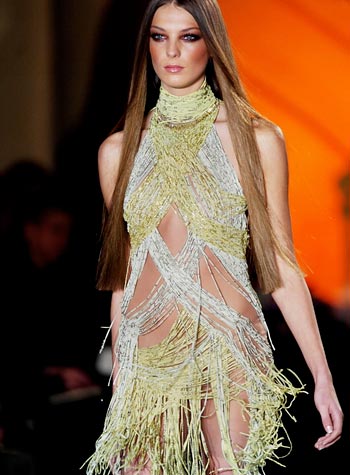 A model presents a light dress as part of Versace's Spring-Summer 2004 haute couture fashion collection, Paris, January 19, 2004.