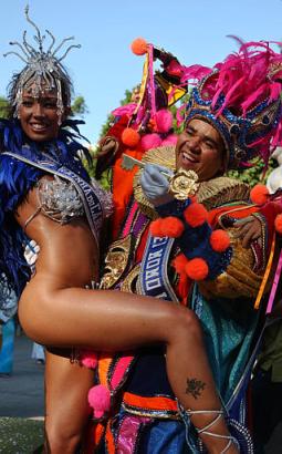 The Queen of the 2003 Rio Carnival, Amanda Barbosa and Rei Momo, or 'Fat King' Alex de Oliveira, holding up the key to the city of Rio, Rio de Janeiro Carnival, Brazil, February 28, 2003.