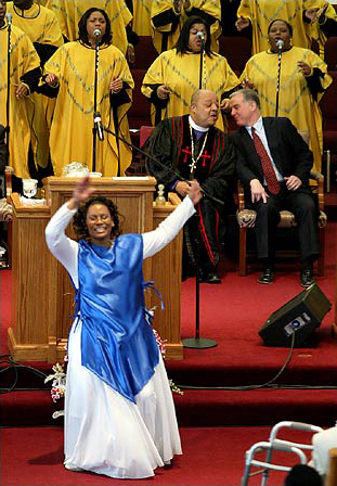 Howard Dean talked with Bishop Sedgewick Daniels at the Holy Redeemer Institutional Church, Milwaukee, Wisconsin, February 1, 2004.
