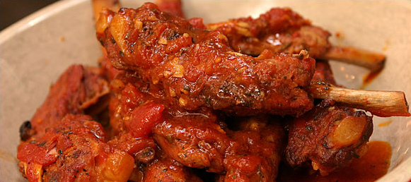 Cowboy-inspired Tuscan-style pork spareribs cooked in Worcestershire sauce, Tabasco and white wine, at Cesare Casella's, New York, March 2004.