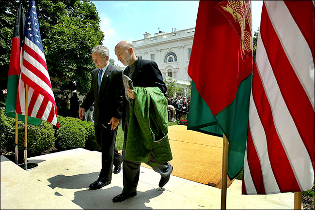 President Bush with President Hamid Karzai of Afghanistan after a news conference at the Rose Garden, Washington, June 15, 2004.