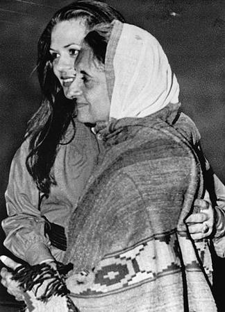 Indian Prime Minister Indira Gandhi embraces her daughter-in-law Sonia, the Delhi airport, March 18, 1977.