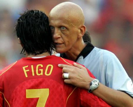 Italian referee Pierluigi Collina talks with Portugal's Luis Figo following the Euro 2004 opening match between Portugal and Greece at the Dragao stadium in Porto, Portugal, June 12, 2004. Greece surprisingly won 2-1.