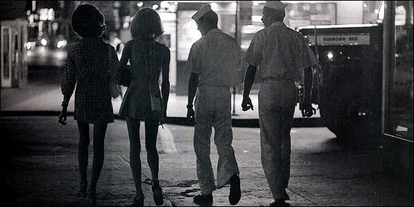 Nightlife regularly ends in the early morning, Times Square, New York, 1970s.