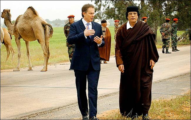 Prime Minister Tony Blair of Britain met with Colonel Muammar Al-Qaddafi, signaling an end of Colonel Qaddafi's estrangement from the West, Tripoli, March 25, 2004.