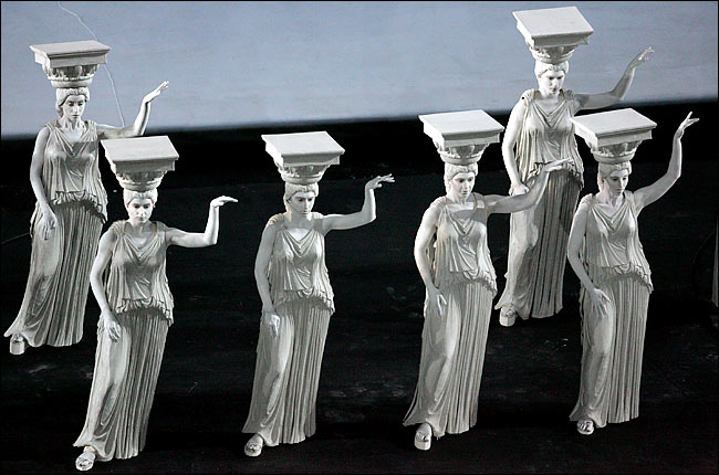 During the Athens 2004 Olympic Games opening ceremony, a procession of figures from Greek history were represented by actors in marble-like costumes, from ancient mythological characters to a tribute to the Greek shepherd, Spiros Louis, who won the first Olympic marathon, August 13, 2004.