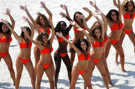Members of the 2004 Olympics Beach Volleyball dance team practice for the opening of the beach volleyball games, Athens, Greece, August 13, 2004.