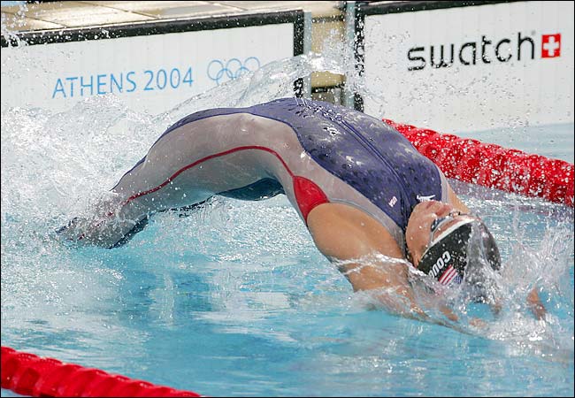 After setting a new olympic record at 1:00.17 in a qualifying heat in the day before, Natalie Coughlin of the U.S. swims to gold in the 100m backstroke, at the 2004 Summer Olympic Games, Olympic Aquatic Centre, Athens, Greece, August 16, 2004.