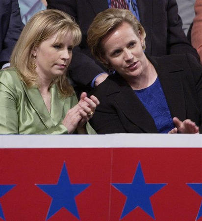 Daughters of Vice President Dick Cheney, Elizabeth, left, and Mary, sit in Madison Square Garden during the Republican National Convention, New York, September 1, 2004.