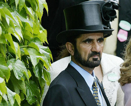 Dubai's Crown Prince and Defence Minister Sheikh Mohammed bin Rashed Al-Maktoum arrives for the third day of the annual Royal Ascot horse race meeting at Ascot, England, June 17, 2004.