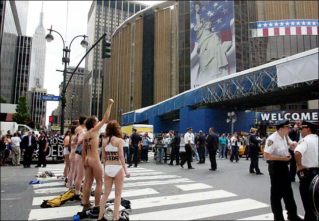 Naked and nearly naked members of Act Up demonstrated against President Bush's record on AIDS in the eve of the Republican National Convention, New York, August 26, 2004.