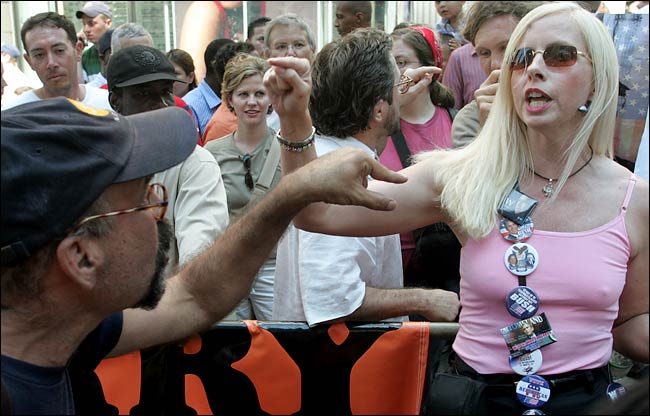 Jane M. Milhans of Tacoma, Washington, a chair of the Pierce County Republican Party, argued with one of the leftist marchers at the corner of 34th Street and Sixth Avenue, Republican National Convention, Madison Square Garden, New York, August 29, 2004.