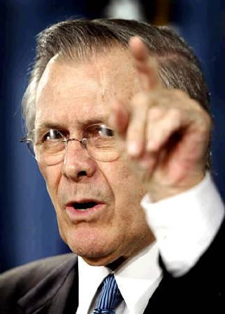 Defence Secretary Donald Rumsfeld responds to a question during a briefing at the Pentagon, February 11, 2004.