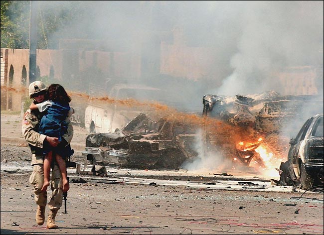 The first explosion was followed by two more that struck those who rushed to the aid of the initial victims, Baghdad, September 30, 2004.