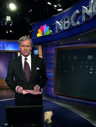 Tom Brokaw, who held the network's top news anchor job since September 1983, poses on the set of the NBC Nightly News at an NBC studio, New York, February 1, 2001.