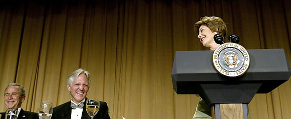 President Bush and Ron Hutcheson, the White House Correspondents' Association president, appreciate Laura Bush's 'Desperate Housewives' stand-up comedic speech, the 91st annual White House correspondents' dinner, Washington Hilton, April 30, 2005.