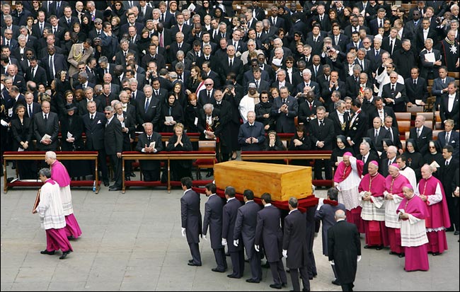 The funeral of Pope John Paul II starts with the coffin carrying the body brought outside and placed before the altar on the esplanade in front of St. Peter's Basilica at the Vatican, April 8, 2005.