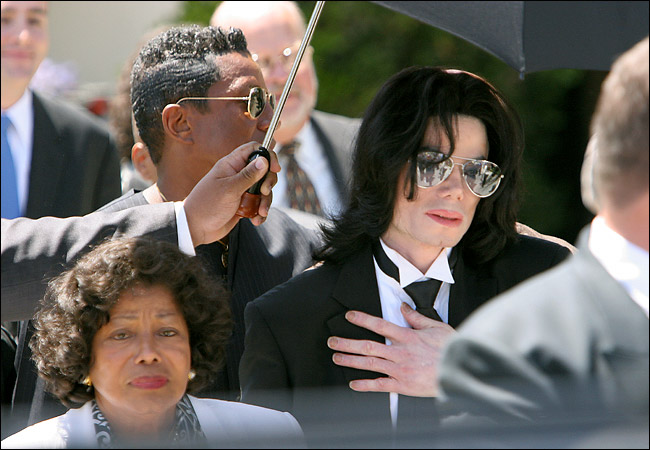 Michael Jackson leaving the courthouse along with his family and lawyers, after learning that he had been acquitted of all charges, outside Santa Barbara County Superior Court, Santa Maria, California, June 13, 2005.